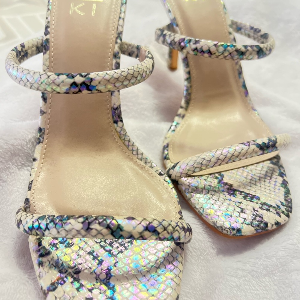 3 inch heels never used they are snake skin material